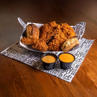 2 Pieces Tenders, 2 Piece Fried Chicken (Bone-In), 2 Sauces, 2 Rustic Butter Biscuits